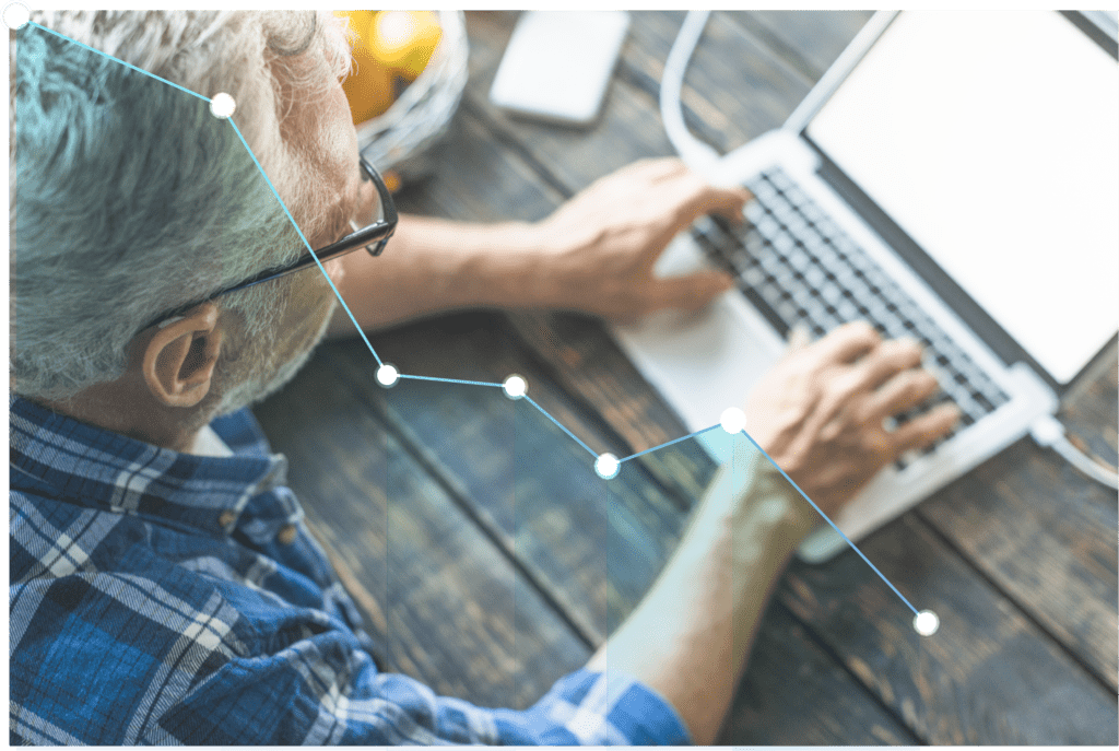 Understanding Market Downturns Man on Laptop